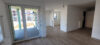 Neubau Erstbezug! Rollstuhlfahrer-Appartement mit Terrasse - WBS erforderlich - Heller Wohn-/Essbereich mit Terrassenzugang
