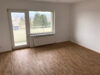 Modernisierte 2 - Zimmer - Wohnung mit Blick in den Taunus - Wohnzimmer