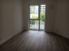91101/27 - Schöne, helle 3-Raum-Wohnung im EG mit Terrasse zum grünen Innenhof - Teilansicht Wohnzimmer.JPG