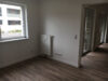 91101/27 - Schöne, helle 3-Raum-Wohnung im EG mit Terrasse zum grünen Innenhof - Blick aus Küche Richtung WoZi.JPG